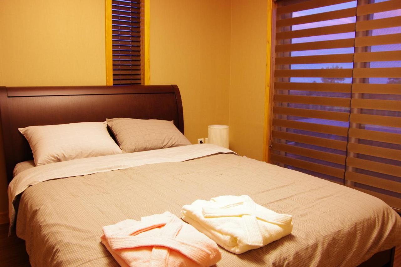 Jeju Eco Suites Seogwipo Chambre photo